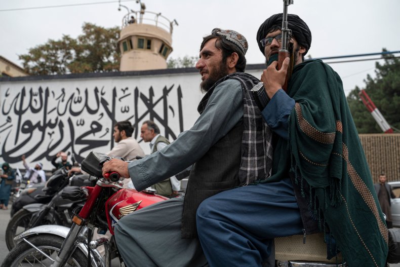 Taliban, members, celebrate, anniversary, Islamic, Emirate, rule