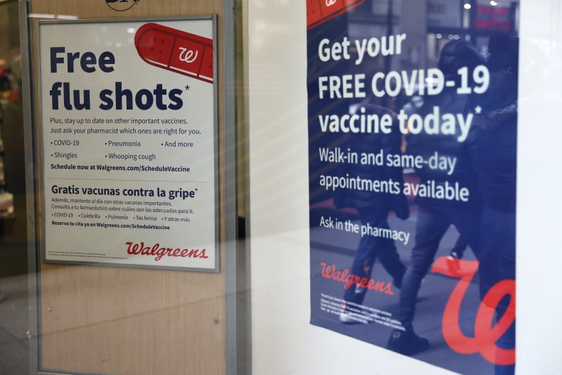 Flu and COVID vaccine shot signs
