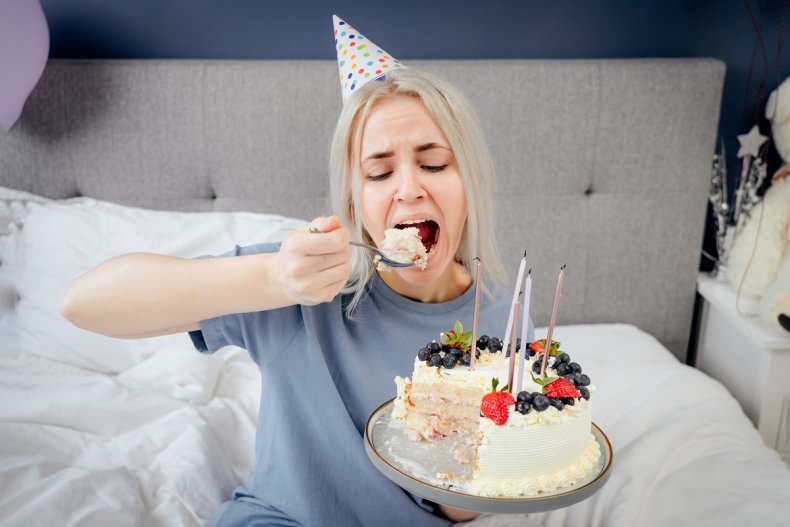 Woman Eats Her Own Birthday Cake