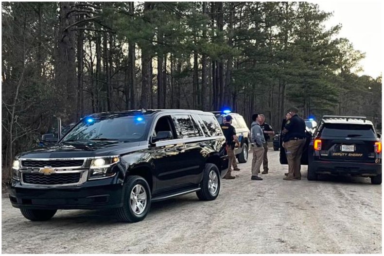 Photo of KCSO police officers and vehicles