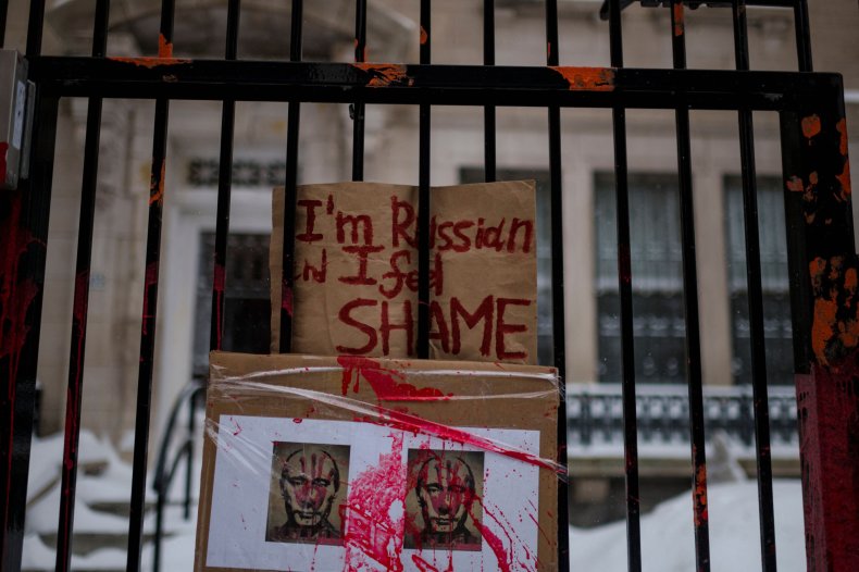 Protest signs outside Russia consulate Quebec Canada