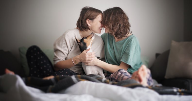 Two women rubbing noses