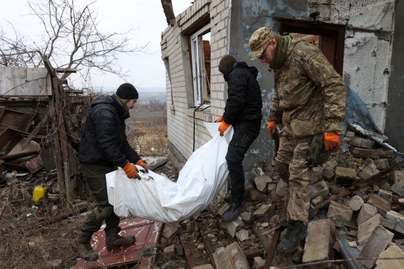 Ukrainians carry dead Russian soldiers Donetsk Donbas