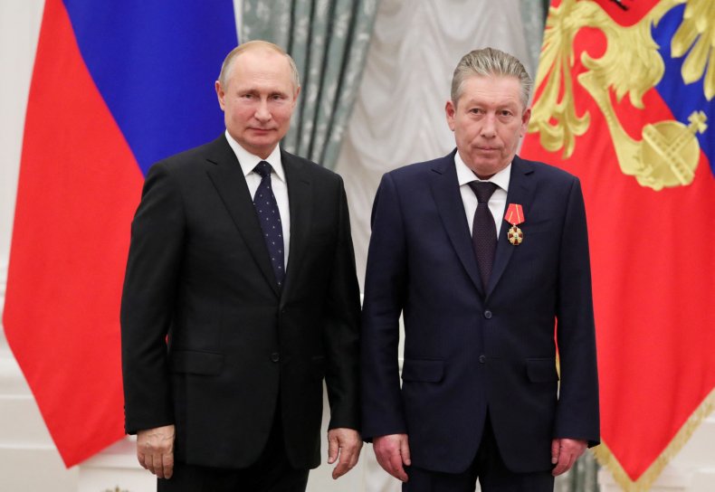 Russian President Vladimir Putin and Ravil Maganov