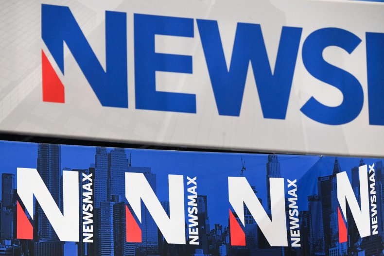 Signage for the Newsmax conservative television broadcasting