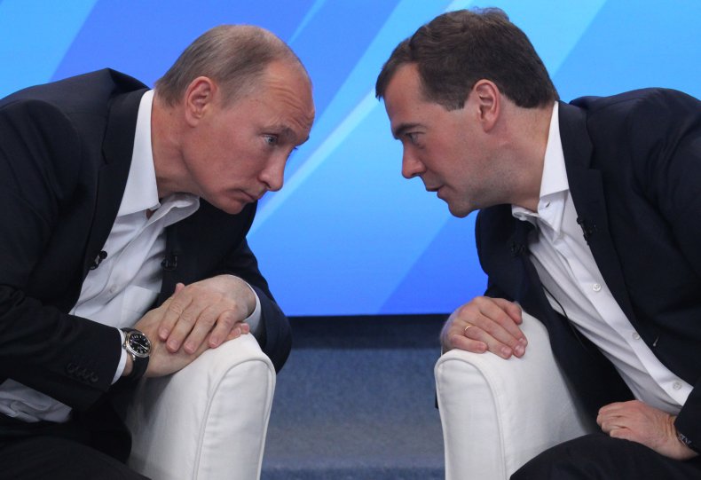 Russian President Vladimir Putin and Dmitry Medvedev