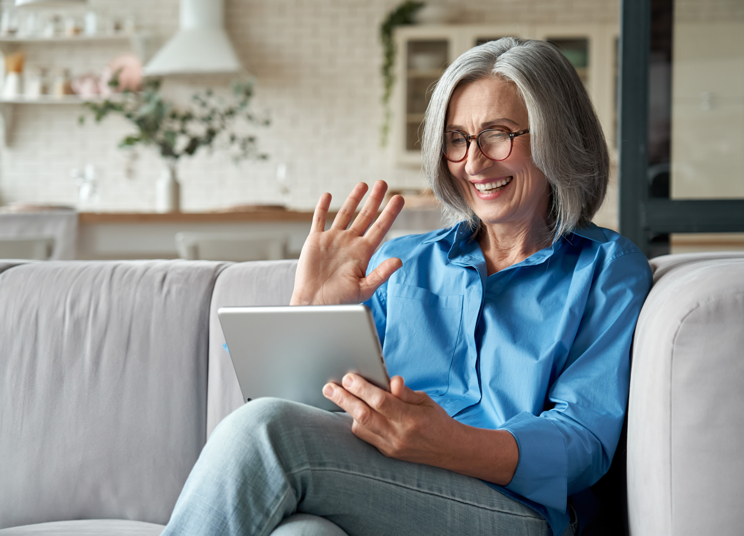 older person using a tablet 