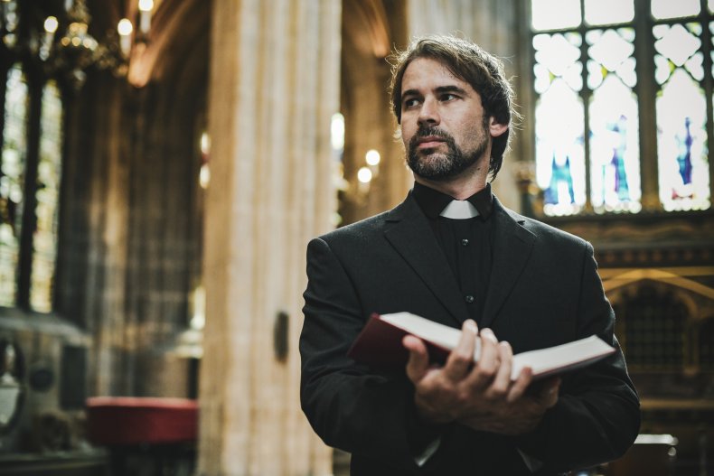 A pastor delivering a sermon in church