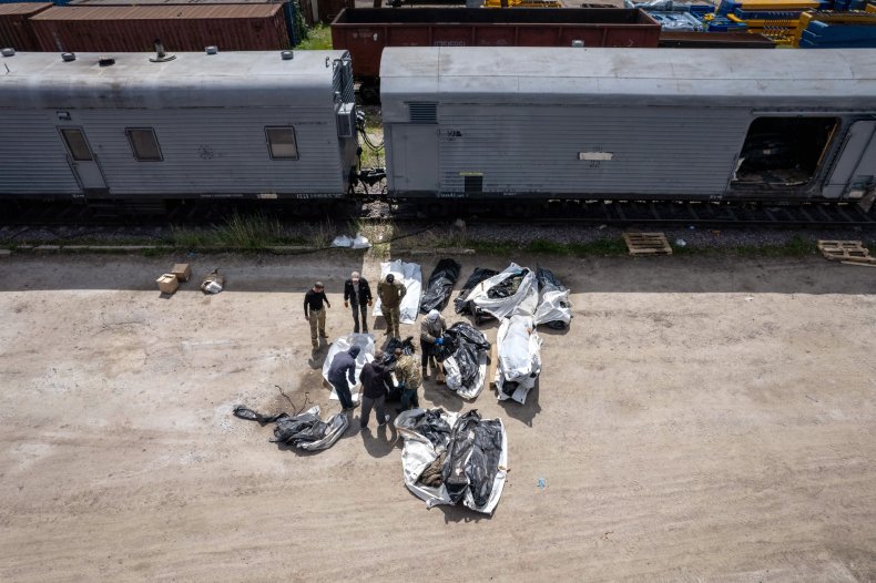 Ukrainians bag dead Russian soldiers Kharkiv offensive
