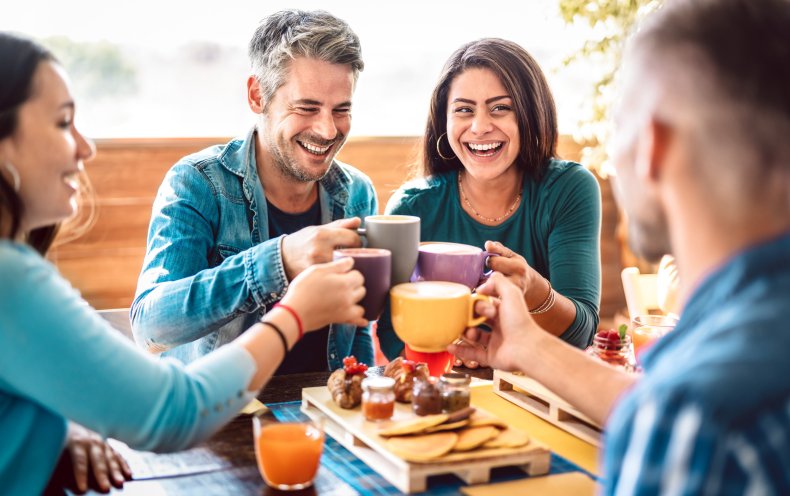 Friends having coffee and snacks.