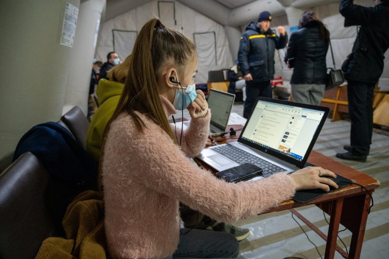 Ukrainian girl on laptop in Lviv cyber