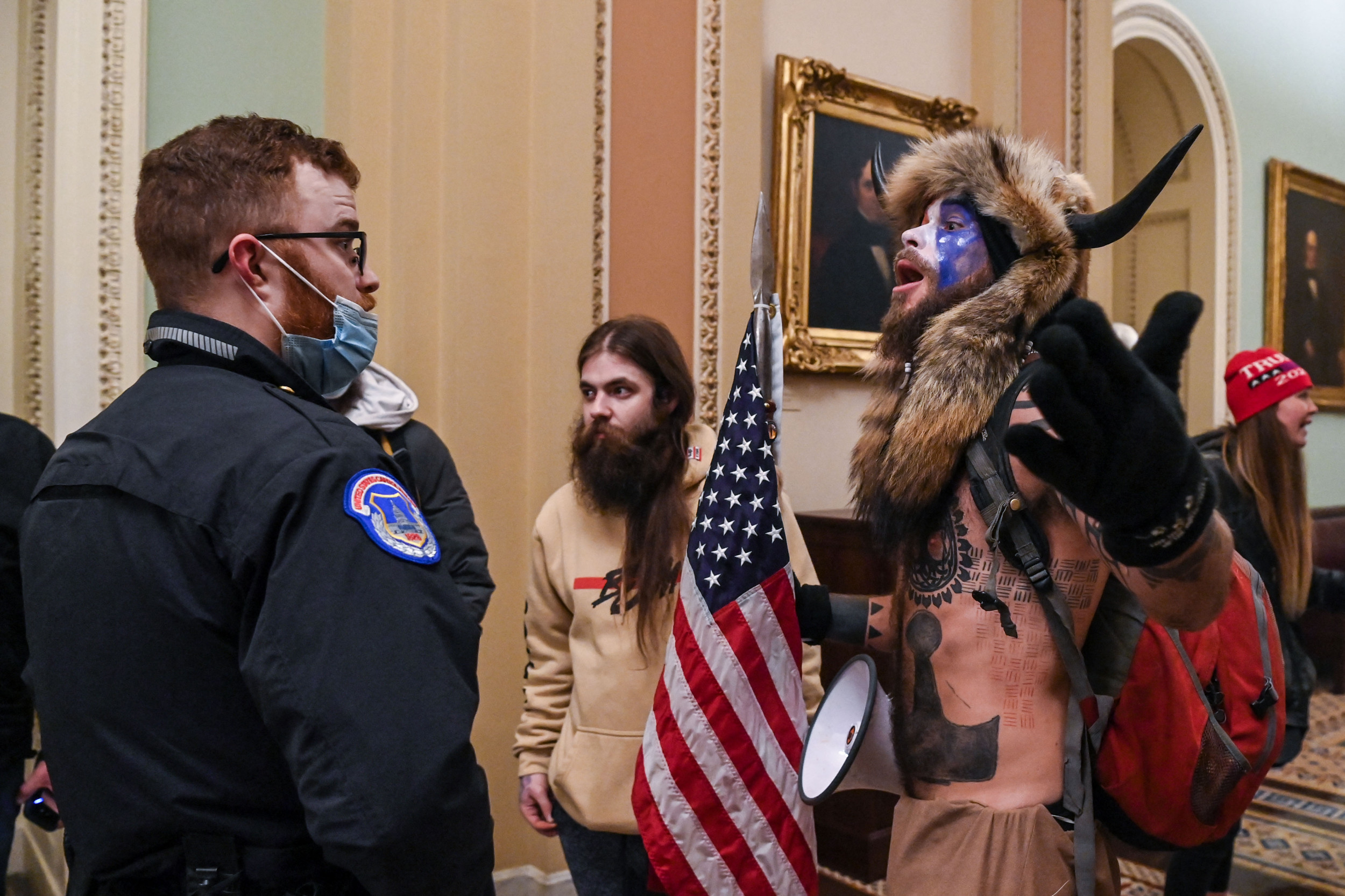 QAnon Shaman Video Raises Questions About Capitol Police Officers