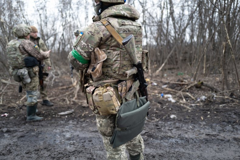 Ukrainian soldiers in the woods near Bakhmut