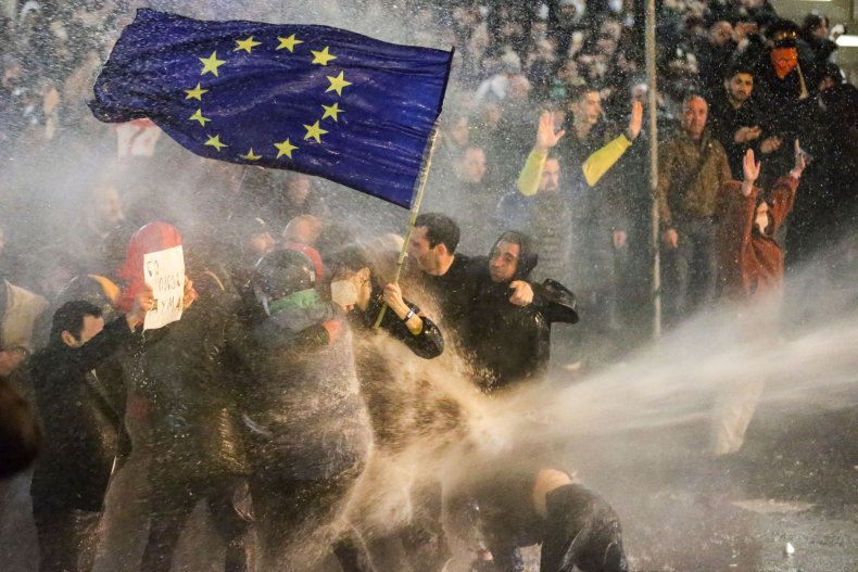 Georgian protesters vs water cannon Tblisi EU