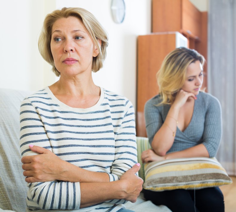Senior woman ignoring adult daughter post-argument