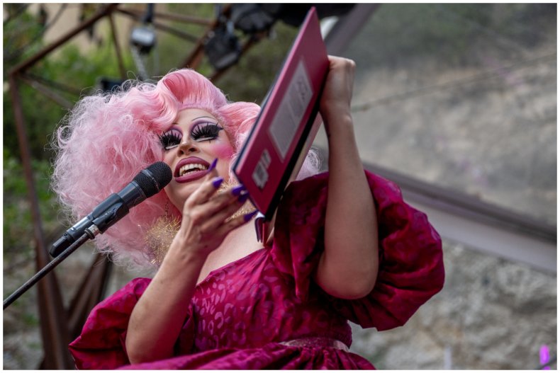Drag Queen Brigitte Bandit reads a book
