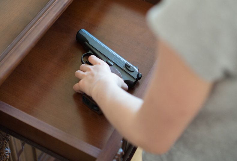 Child finds gun stock photo