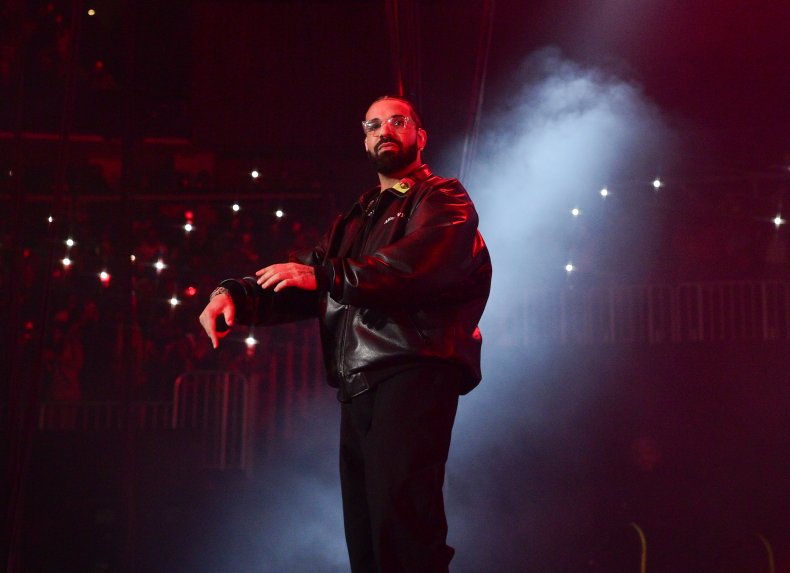 Drake performing on stage in 2022