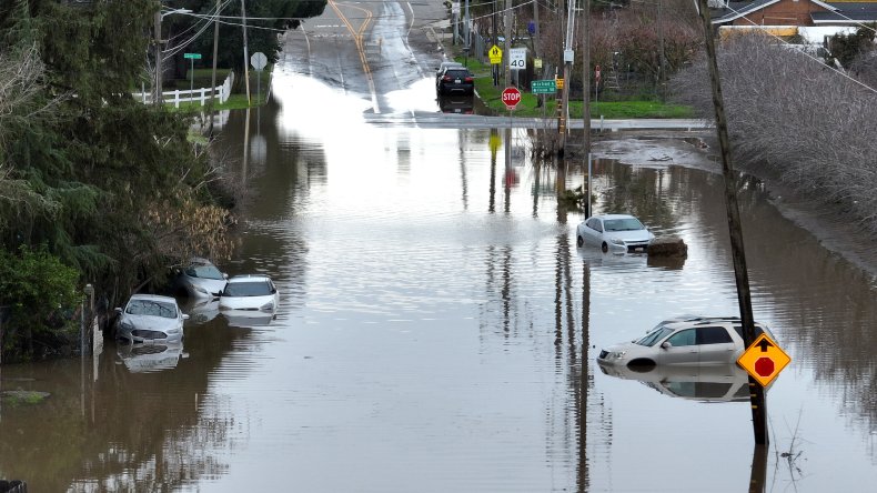 Cars stranded in a flooded street