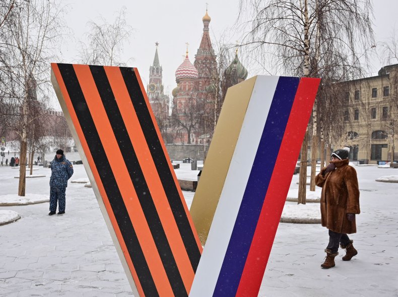 V symbol in front of Kremlin Moscow