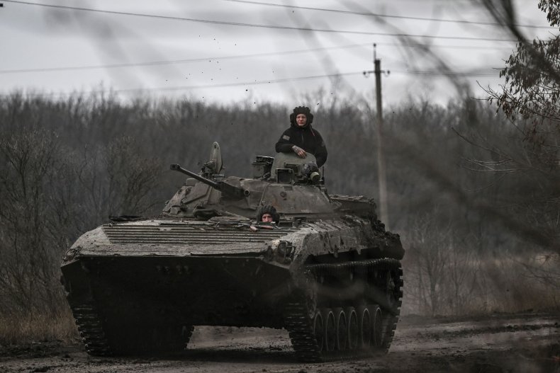 Ukrainian servicemen on a BMP-2 tank