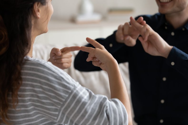 Couple Communicating With Sign Language 