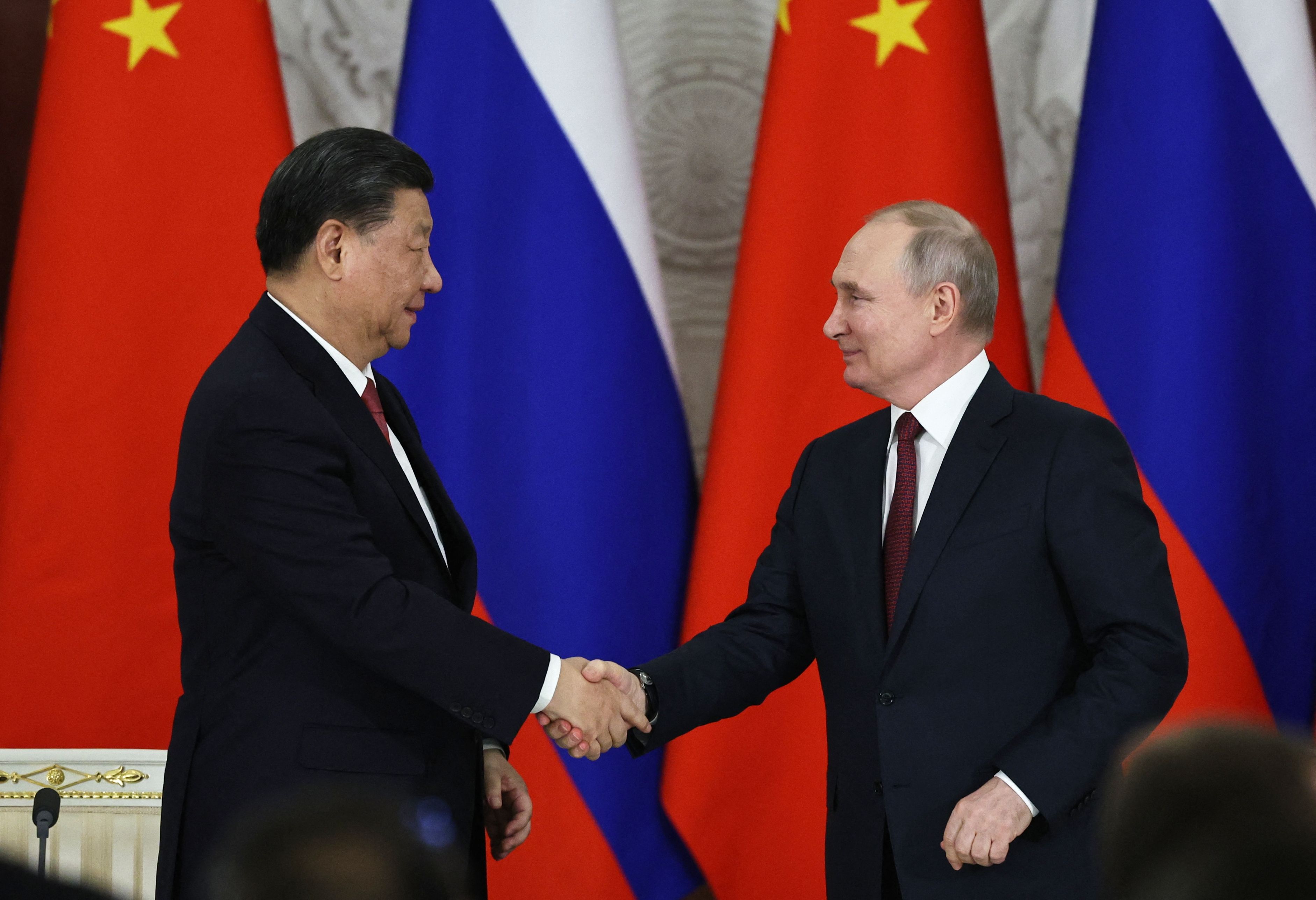 Xi’s comments to Putin about “driving changes together” caught on video