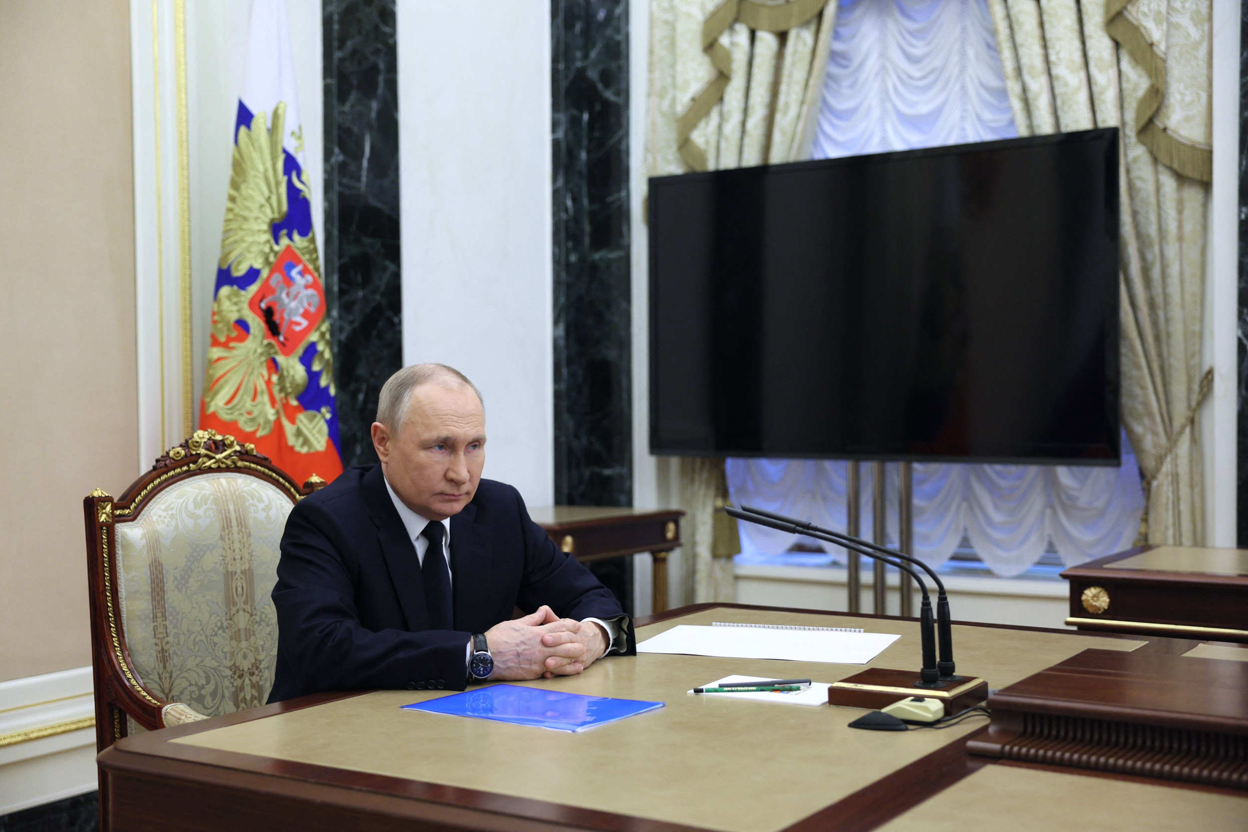 russian president vladimir putin attends meeting