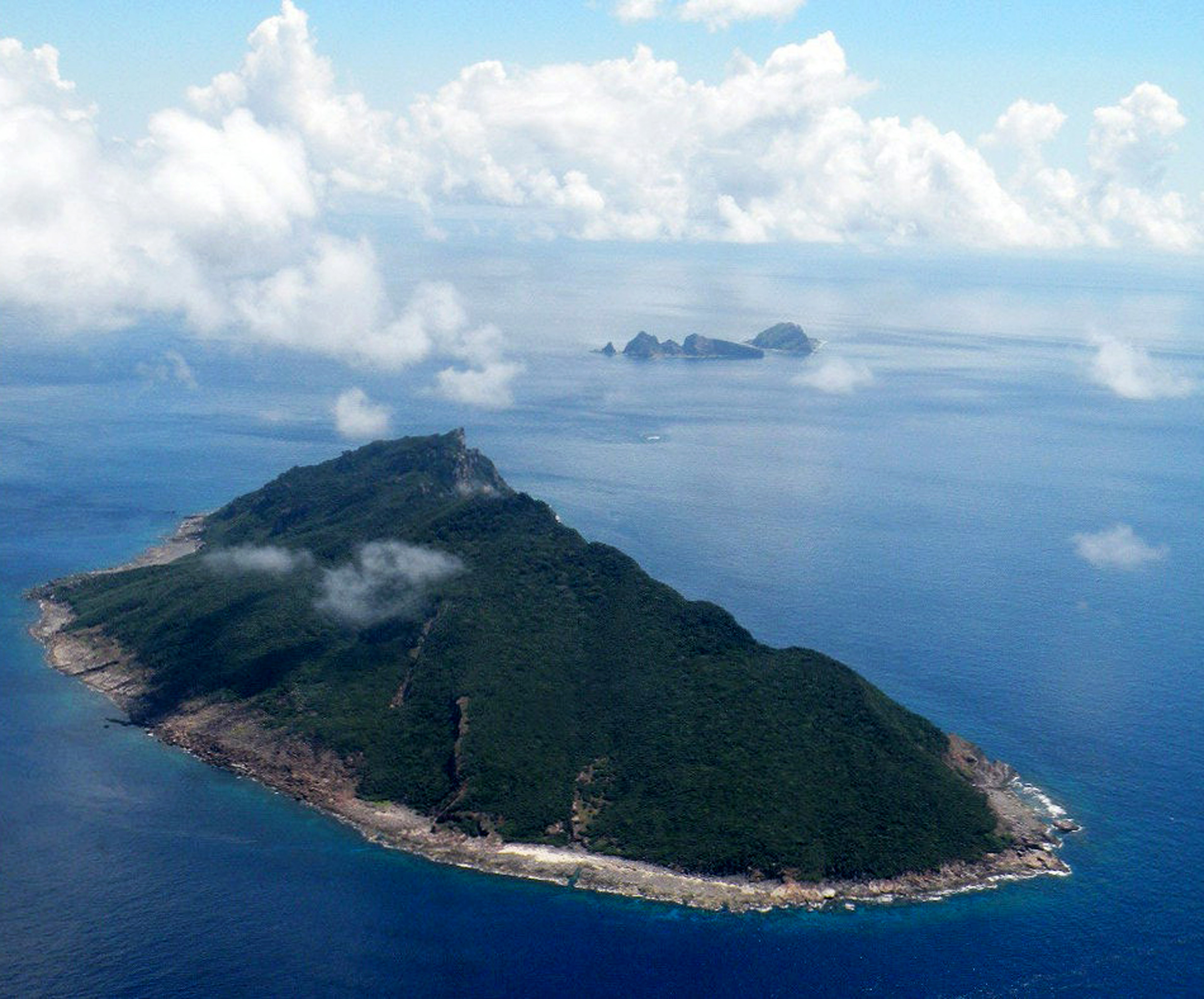 中国、日本の係争中の尖閣諸島を 80 時間以上船積み