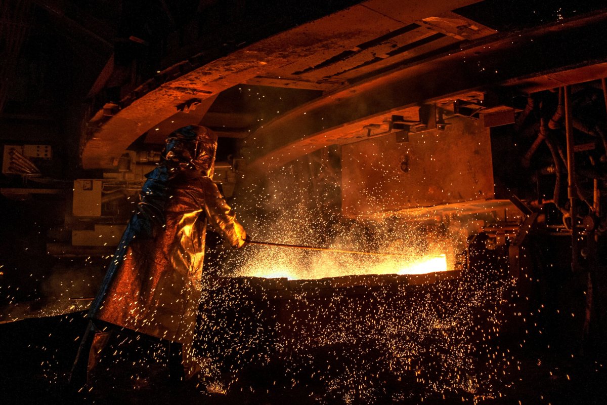 Indonesian worker smelting nickel at PT Vale