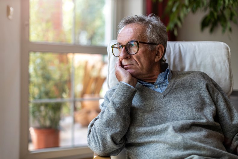Man staring out of the window