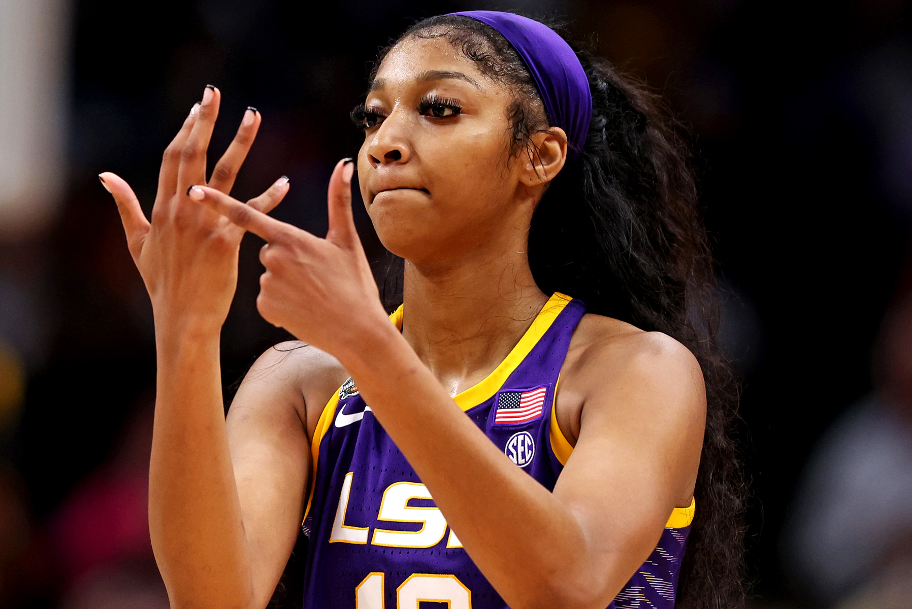 Angel Reese Reenacts Infamous Hand Gesture in Video During LSU Parade