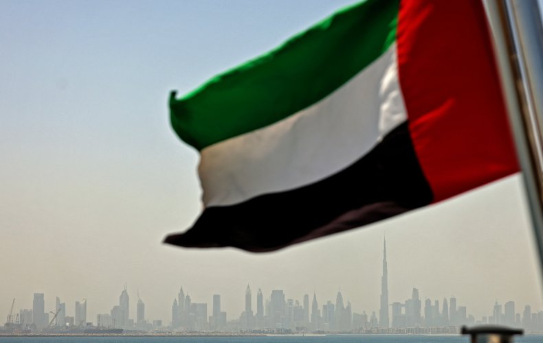 The Emirati flag sways in the wind