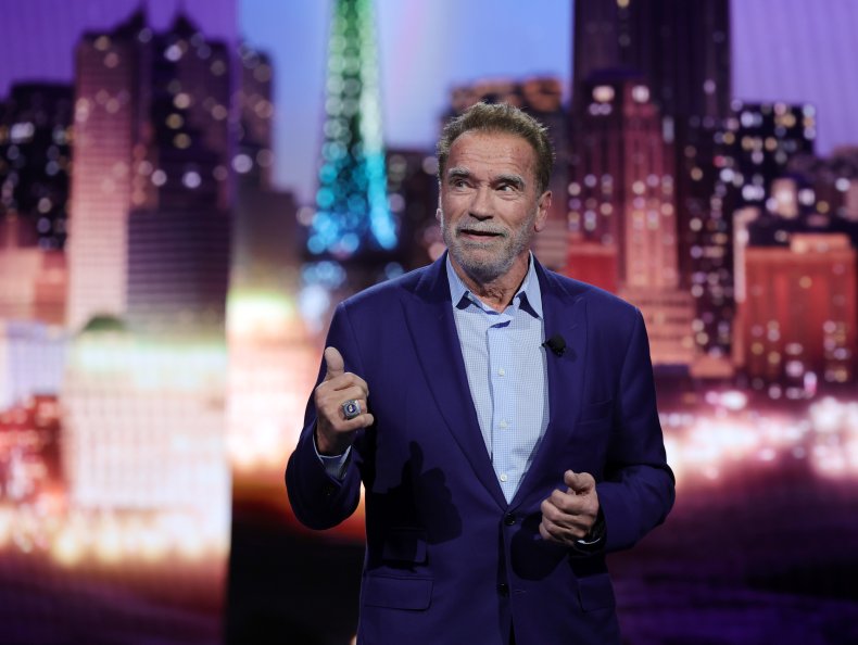 Arnold Schwarzenegger talking on stage