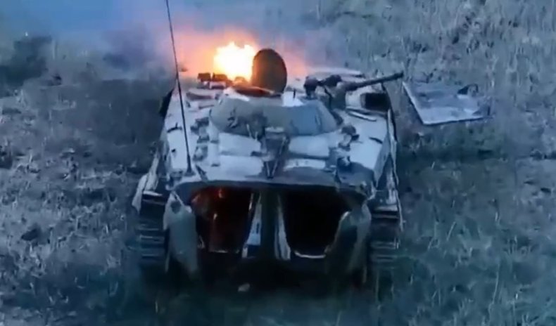 Russian troops under tank