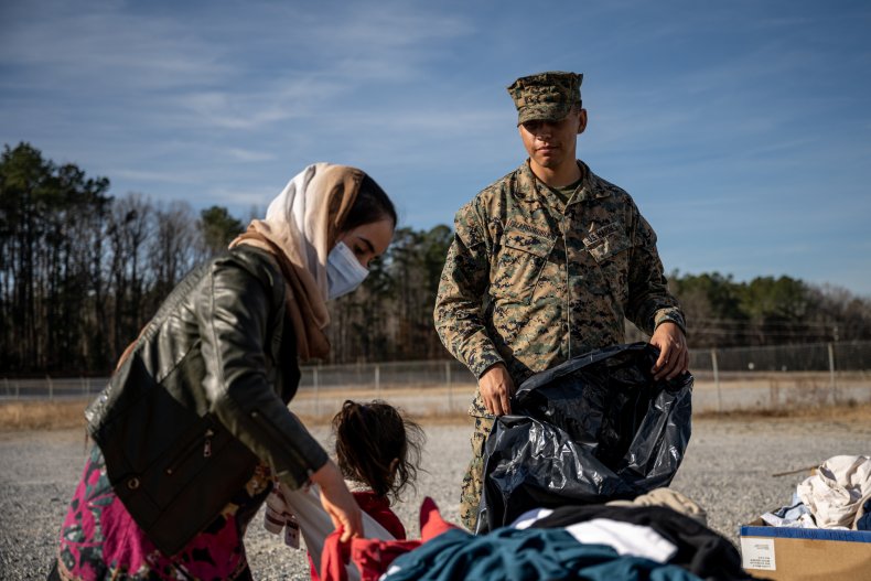A woman and her child are assisted