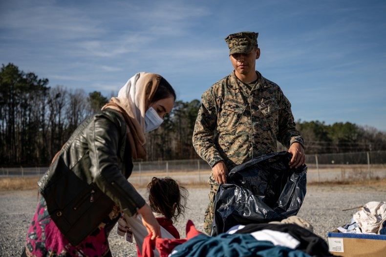 A woman and her child are assisted 