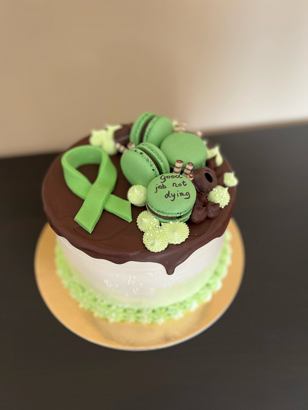 The humorous cake given to cancer survivor