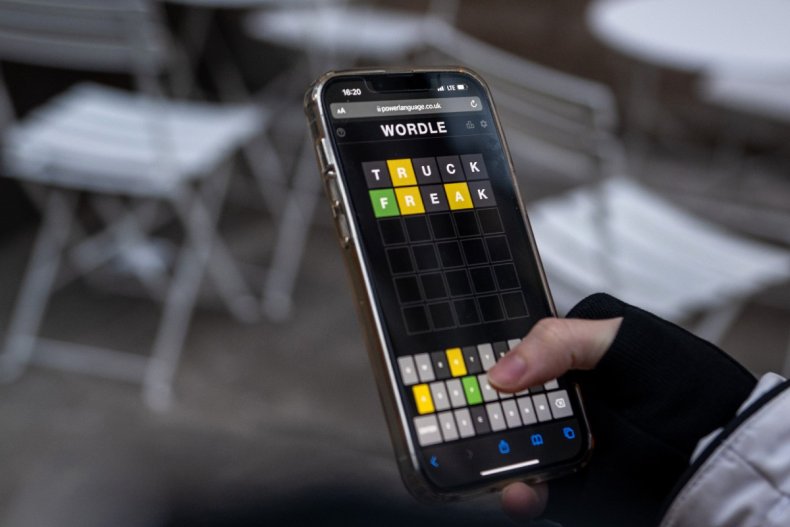 Person playing Wordle