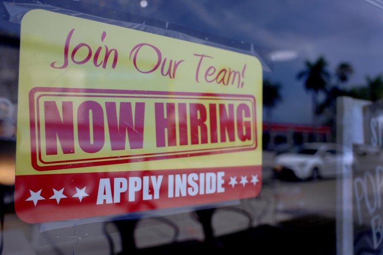 A 'Now Hiring' sign 
