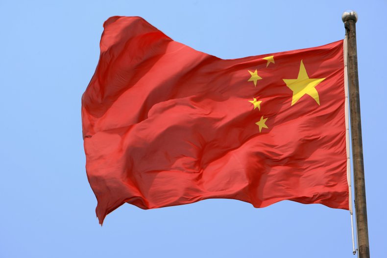 A Chinese flag flies