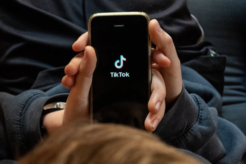 TikTok logo on phone