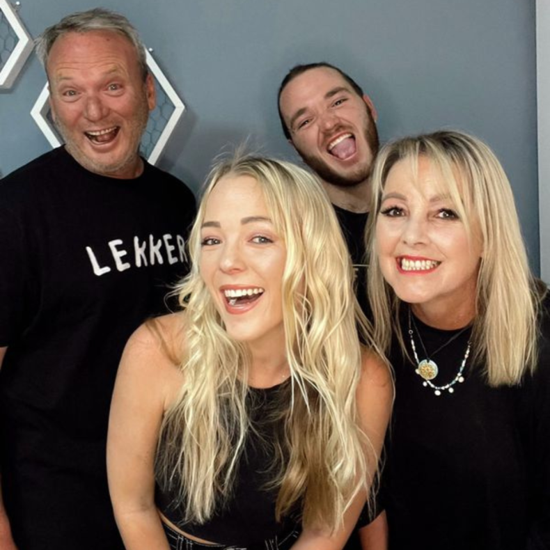 Erin and Joshua Reid with their parents
