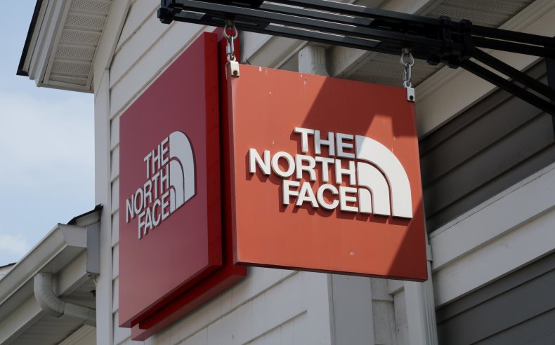 The NORTH FACE sign hangs 