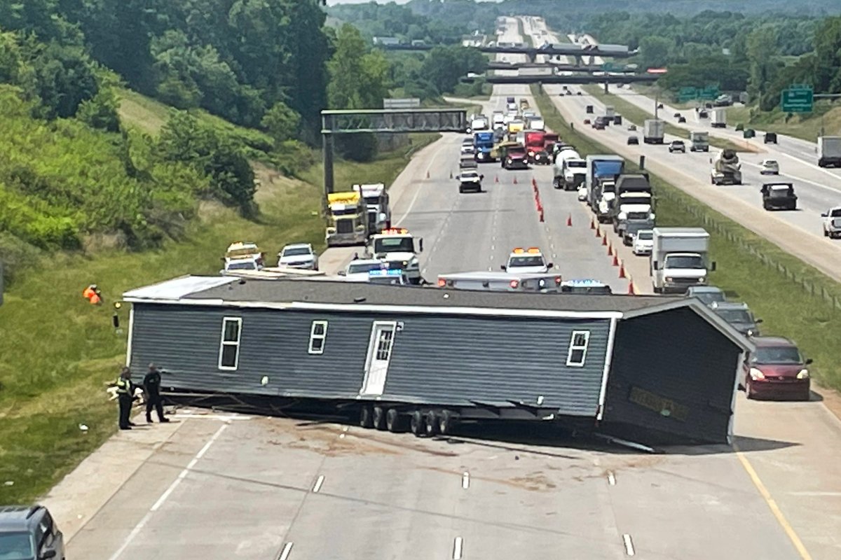 House Blocks Highway Traffic Falls Off Truck
