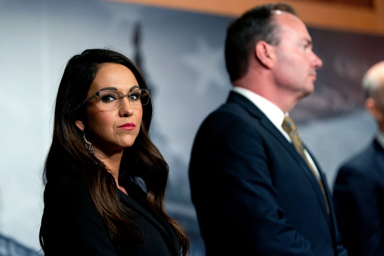 Representative Lauren Boebert (R-CO) (L) listens