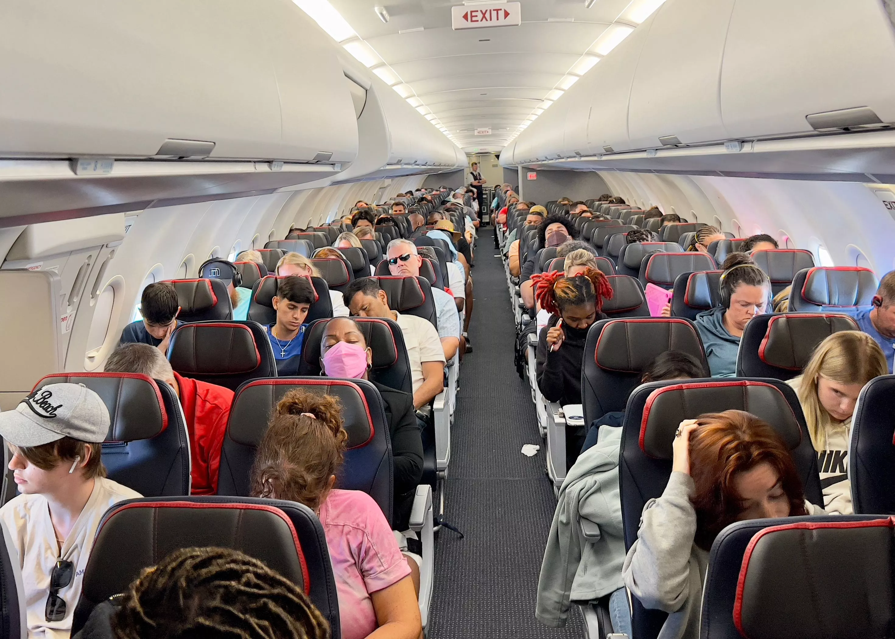 Woman Calls Out 'Racist' Passenger Then Stuck Next to Him on 4-Hour Flight - Vimarsana News