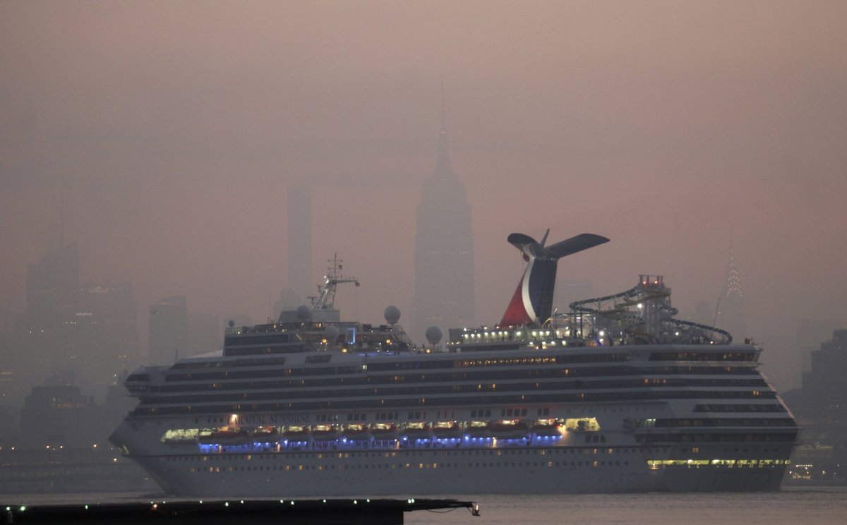 The Carnival Sunshine cruise ship passes by