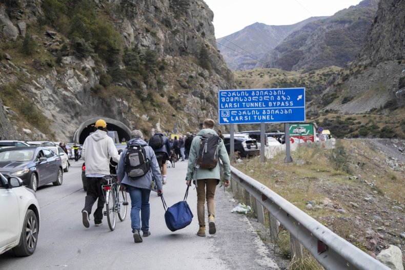 People cross the Russia-Georgia border after mobilization