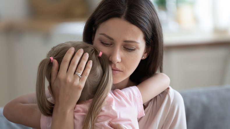 mom hugging child